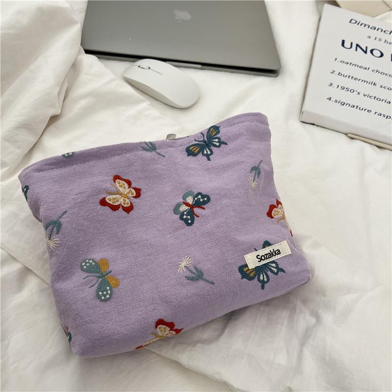 

Cyan Butterfly Embroidered Makeup Bag Portable Zipper Storage Pouch Sweet Style Small Cosmetic Case Embroidery Canvas Horizontal Shape Soft Handle фіолетовий