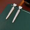 Silver Zirconia Bow Tassel Earrings: Korean Style, Exaggerated Luxury Ear Stud Ornaments.