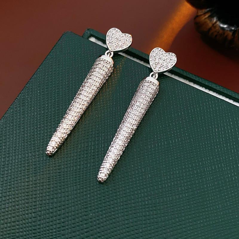 Silver Zirconia Bow Tassel Earrings: Korean Style, Exaggerated Luxury Ear Stud Ornaments.