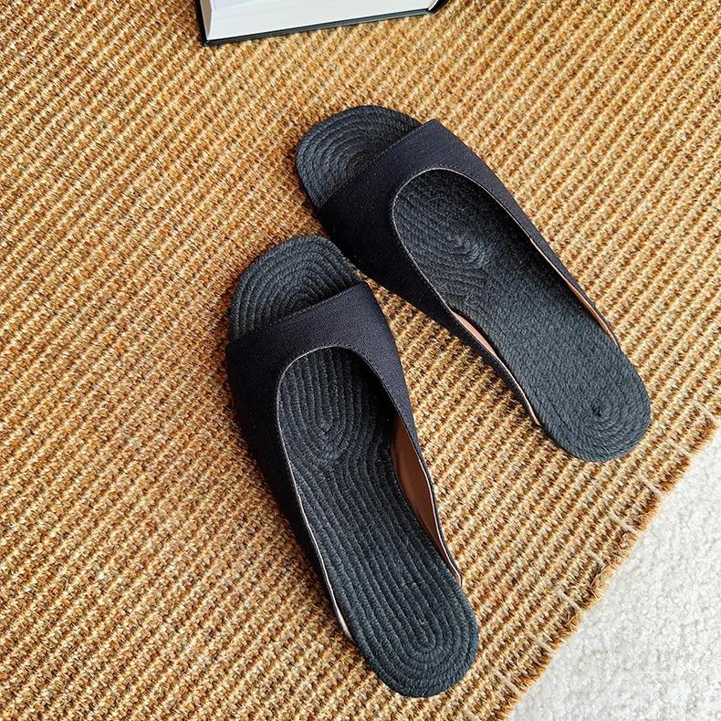Leather retro straw woven linen flat-bottomed one-word slippers for women to wear summer new fashion vacation beach cool slippers