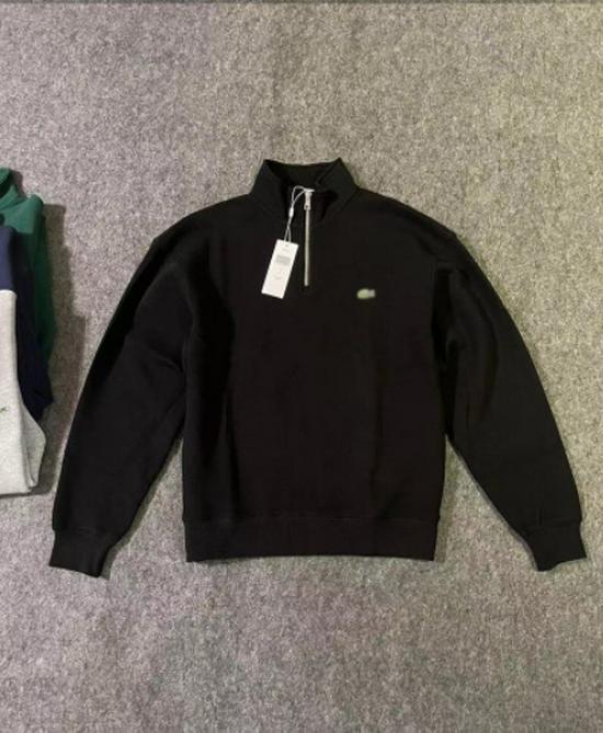 Modischer Herren- und Damen-Halbzip-Baumwoll-Hoodie mit Krokodil-Logo und gestickten Details.