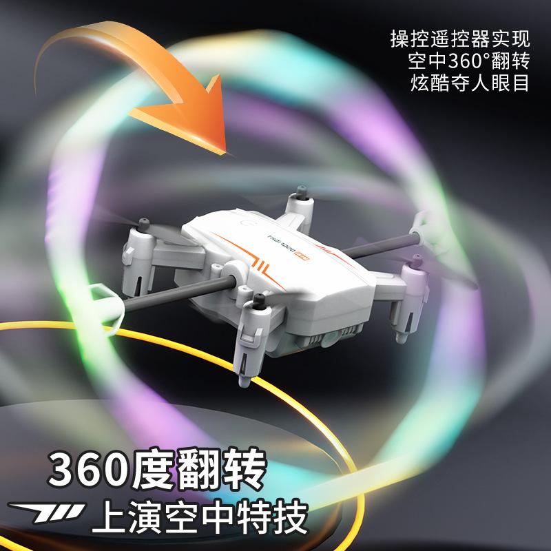 Dron akrobacyjny z kolorowymi światłami, przewracający się, obracający, czterowirnikowy, ze stałą wysokością utrzymywaną przez ciśnienie powietrza, samolot zdalnie sterowany