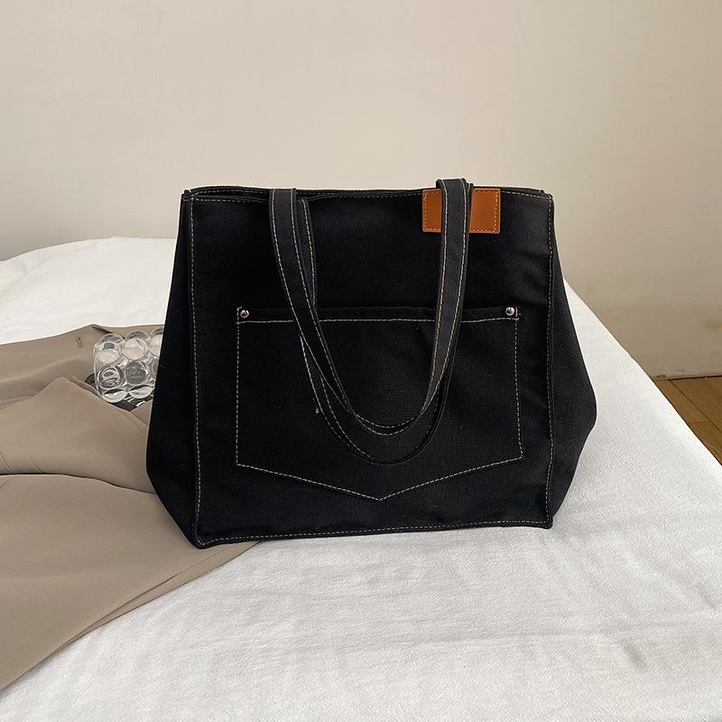 

European and American fashion canvas women s bags women s handbags shoulder bags large capacity leisure bags shoulder bags commuter bags