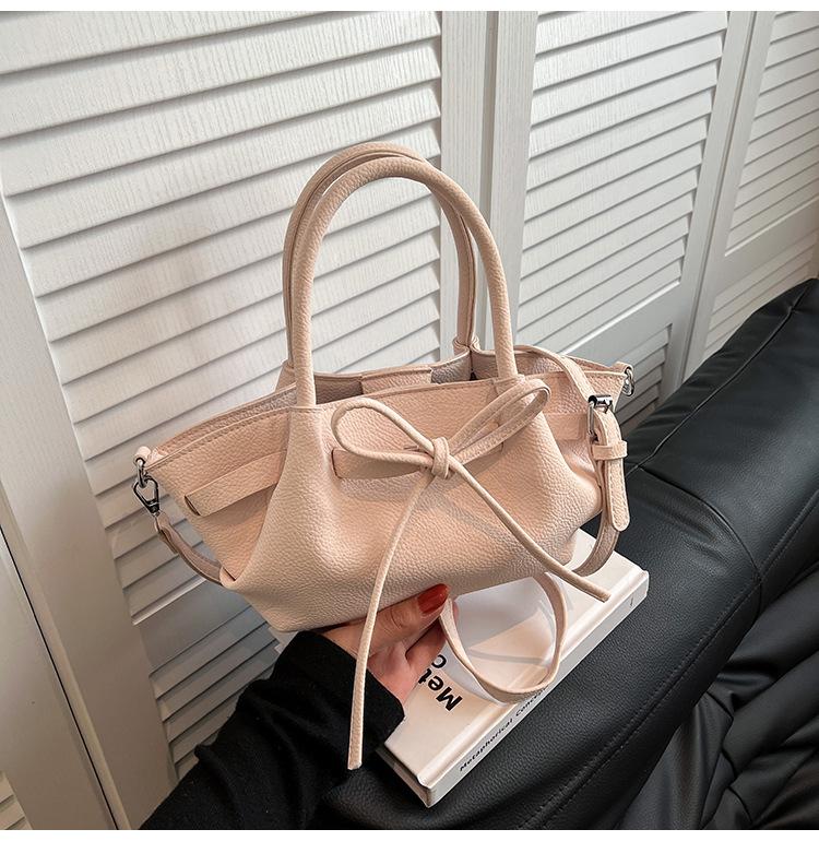 

Niche fashion handbag women s 2025 spring new vegetable basket bag Korean version texture versatile shoulder women s bag рожевий