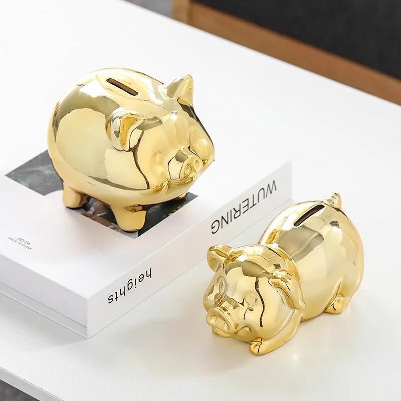 Spardose in Form eines goldenen Keramikschweins – Niedliche Münzspardose – Aufbewahrungsmöglichkeit – Dekoratives Wohnaccessoire – Glücksschwein-Spardose ZG109