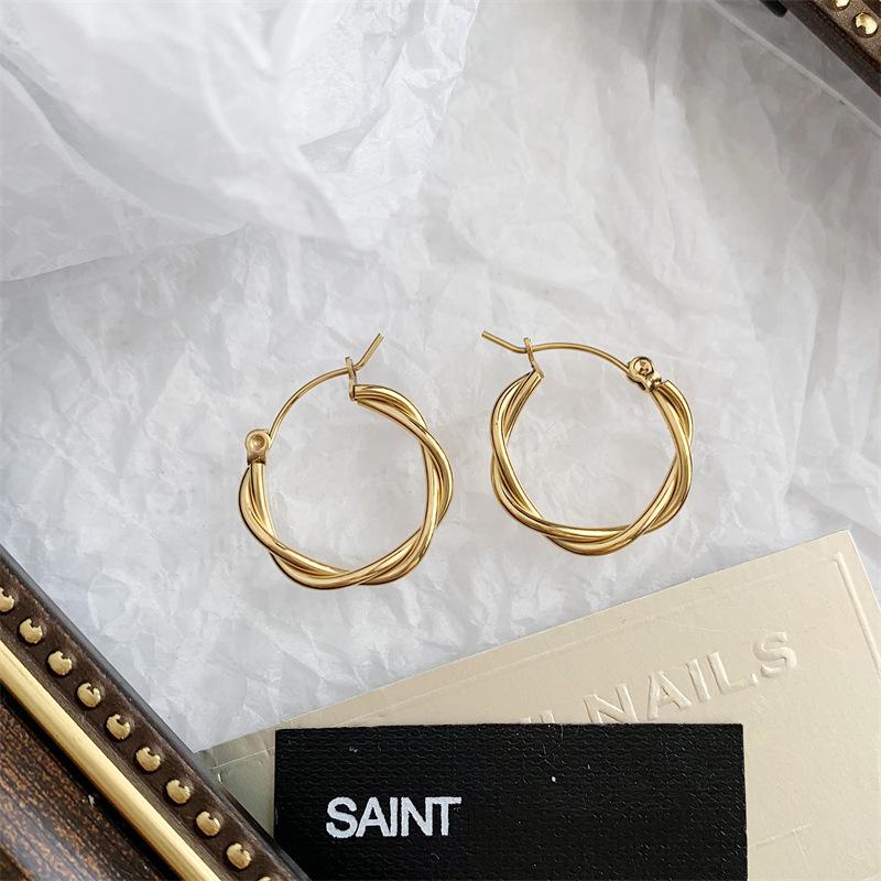 French Retro Gold-Plated Twisted Hoop Earrings - Titanium Steel Studs for Women, European-American Fashion.