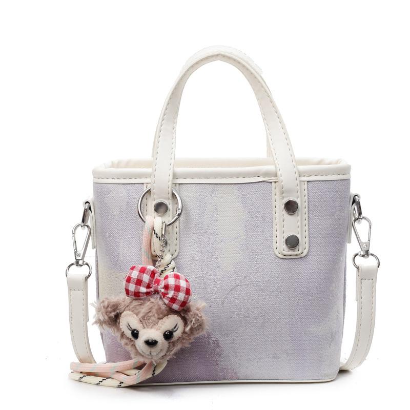 

Textured printing design hand bag women s summer new fashion simple bucket bag women s messenger bag without pendant фіолетовий