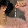 Stylish And Simple High-End Bow Earrings Temperament Versatile Pearl String Earrings French Retro Niche Earrings Women