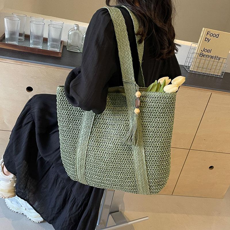 Handwoven Straw Tote Bag Women's Summer Beach Bag with Tassel Detail and Lightweight Design