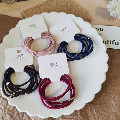 Accessories til hår – Hårelastikker til kvinder