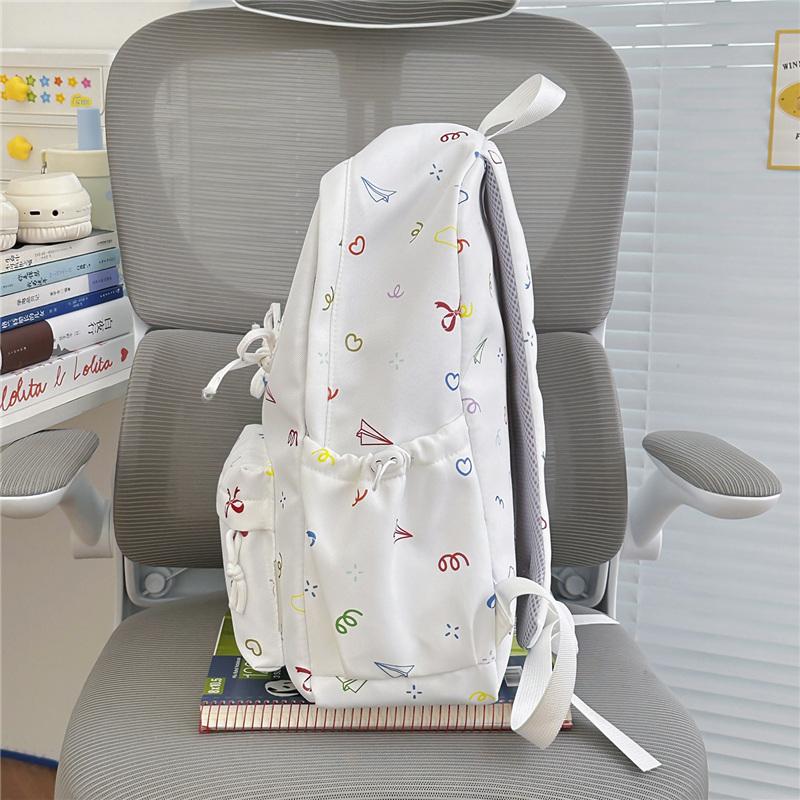 Cute Bow Tie Print School Backpack Lightweight Nylon Zipper Daypack with Front Pocket for Teen Girls Daily Travel