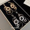 Silver needle European and American knotted round pleated metal fringed pendant earrings versatile stud earrings niche design earrings women