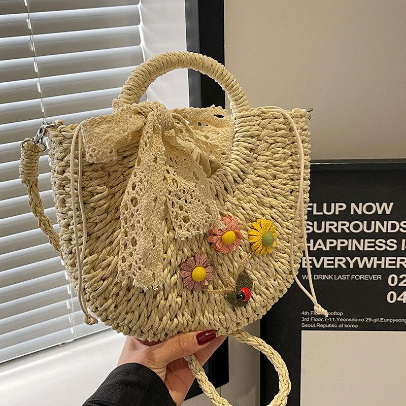 Summer woven bag women's niche design semi-round straw woven bag leisure vacation wind beach bag women's portable messenger bag