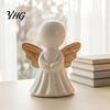 Modern Interior Design Accents Minimalist Angel Figurine with Wood Texture Wings, Compact Statue, Halloween Decorative Ornaments White Sculpture