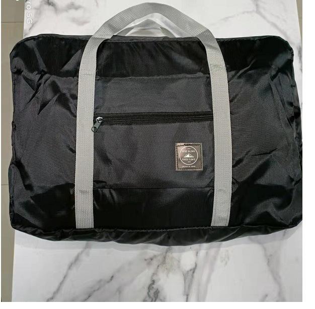

Foldable Waterproof Travel Storage Bag - Large Capacity Portable Luggage Organizer