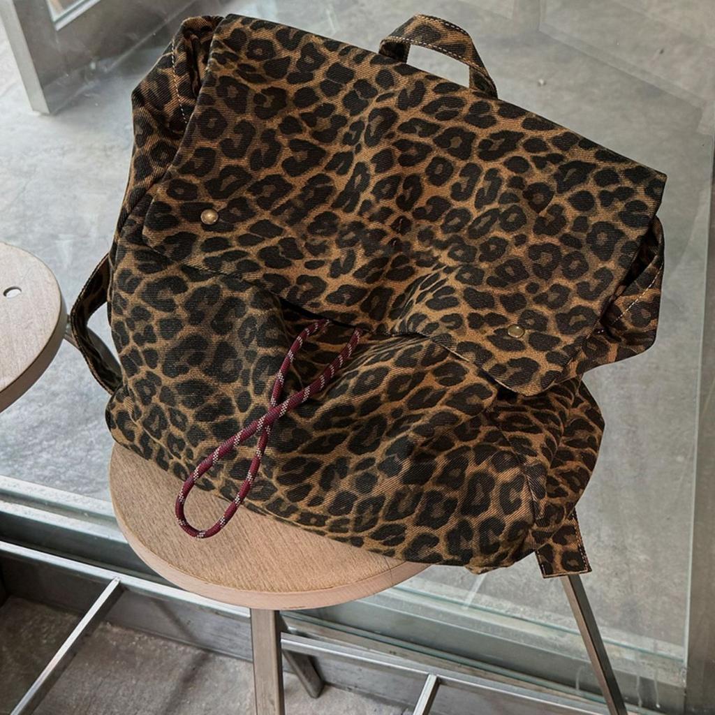 Tide and cool leopard print canvas backpack women's 2025 new casual large-capacity travel backpack female college student schoolbag
