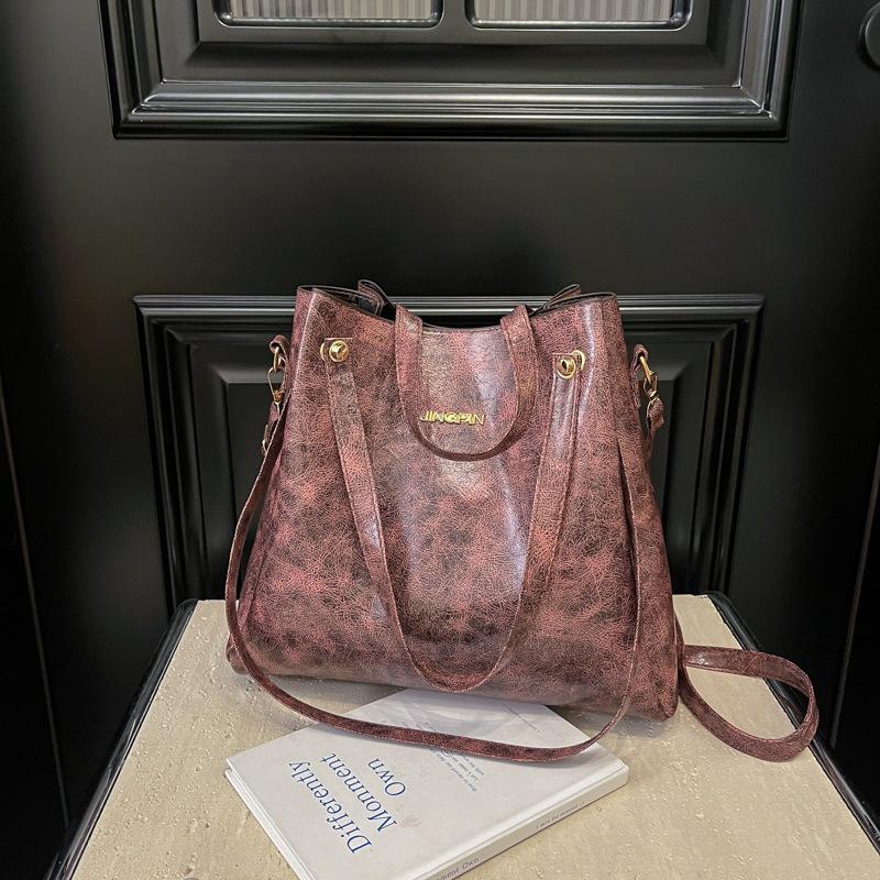 

Большая женская сумка 2025 года, зимняя новая корейская версия, модная простая большая вместительная сумка-тоут, повседневная сумка через плечо в иностранном стиле фиолетовый