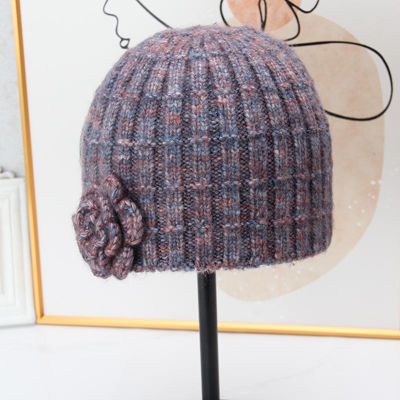 Three-dimensional flower knitted headgear women's autumn and winter face small warm windproof cold hat ear protector wool hat pullover hat
