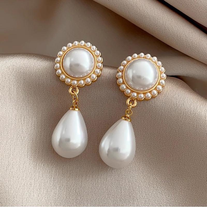Hepburn-Style Retro French Water Drop Pearl Earrings - Women s Elegant, Luxurious, and Unique Stud Ear Jewelry.