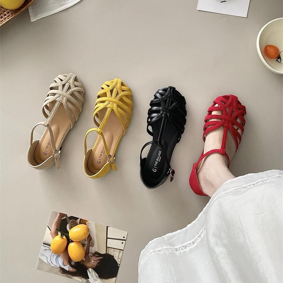 Feenwind flachbodige Schweinekäfig-Sandalen Damen 2025 Sommer neu hohl ein Riemen römisch flachbodig Tasche Kopf Sandalen Damen