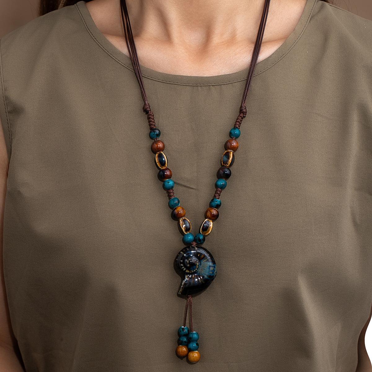 Bohemian Seashell Pendant Necklace: Exotic Ethnic Style with Ceramic Beads for Women