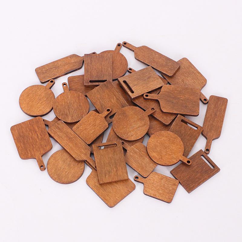 

10/50/100pcs Mini Wooden Cutting Board Dollhouse Cutting Board Wood Chopping Charcuterie Paddle for Scene Setting 10PCS