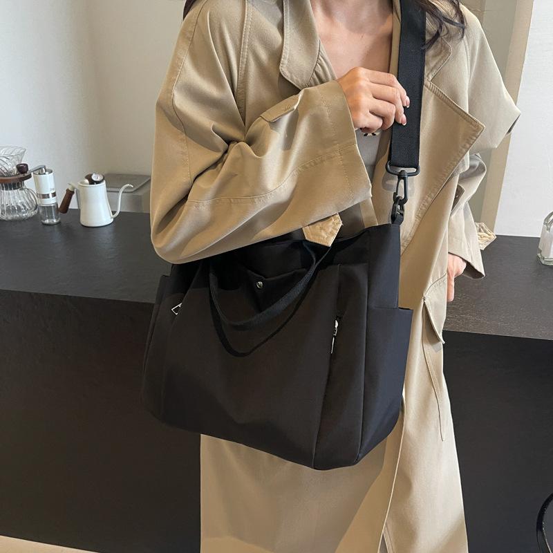 Simple commuter canvas bag Casual women's tote bag Portable multi-functional women's cloth bag Fashion cloth bag Large capacity