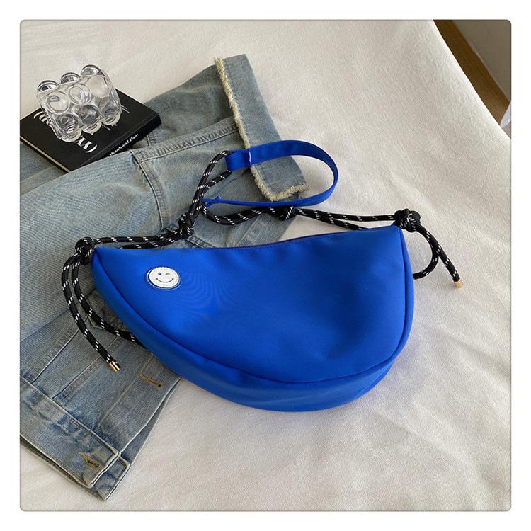 Simple dumpling bag casual 2025 new student schoolbag men's and women's shoulder messenger bag