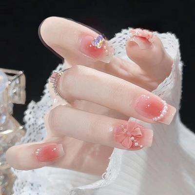 24 szt. Delikatne i słodkie wróżkowe róże kokardki perłowe manicure dziewczęce europejskie i amerykańskie Ins Wind sztuczne paznokcie noszą paznokcie