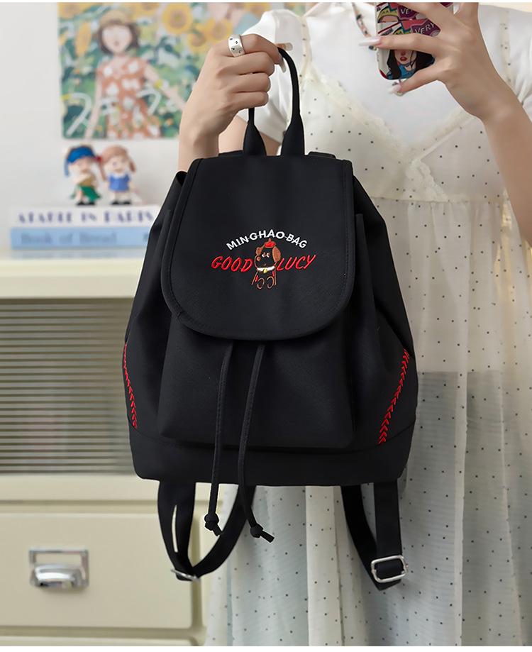 Japanese Student Casual Backpack with Embroidered Puppy Design, Drawstring Closure, and Matching Small Bag for Daily Use.