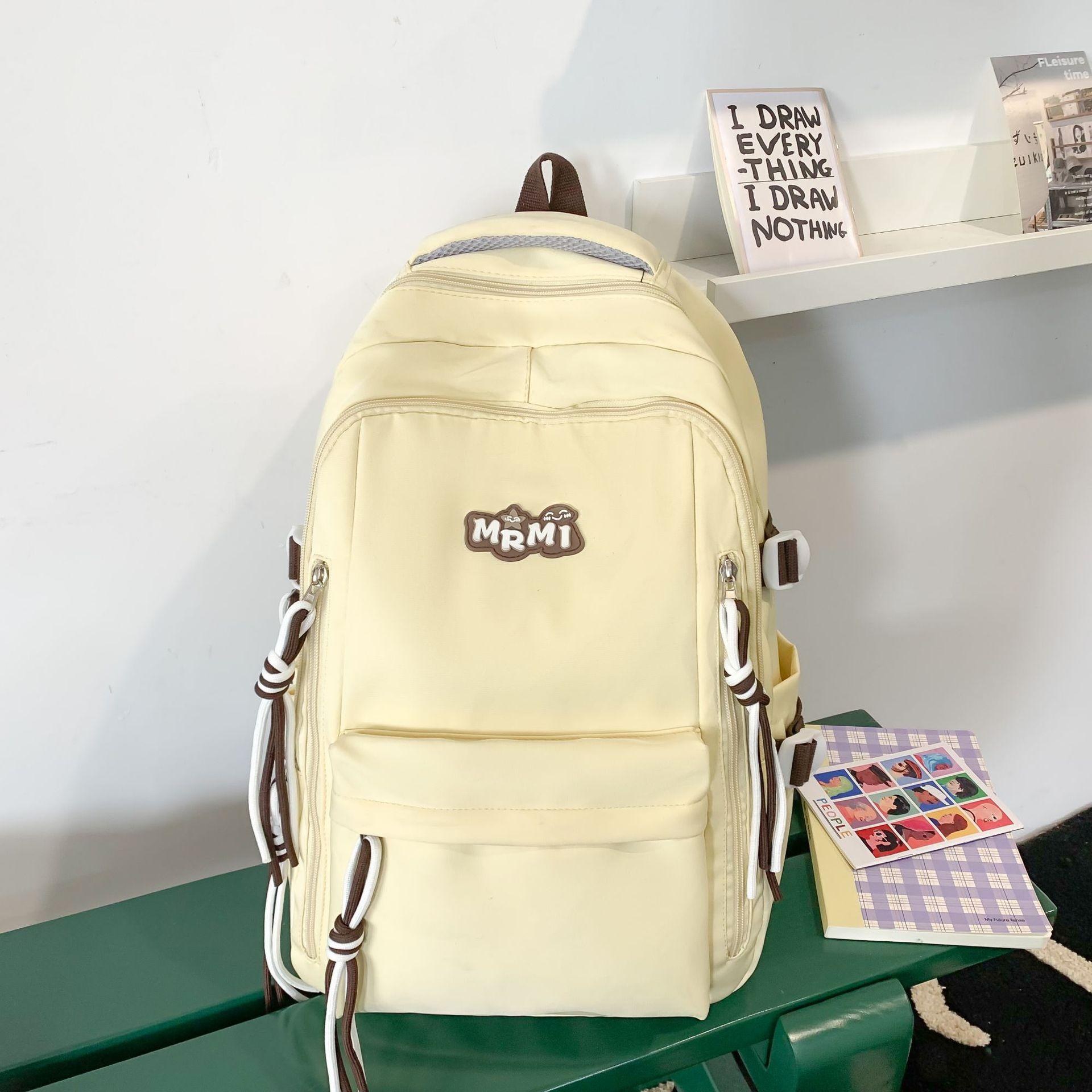 

Small fresh simple solid color large capacity backpack student commuting leisure travel schoolbag