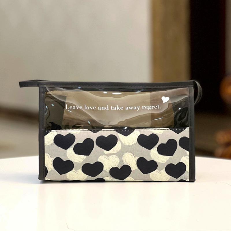 The new Korean version of Zhi Love translucent portable waterproof cosmetic bag, toilet bag, portable cosmetic bag, hand bag, female.