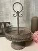 Decorative platter on a leg with a handle metal fruit tray