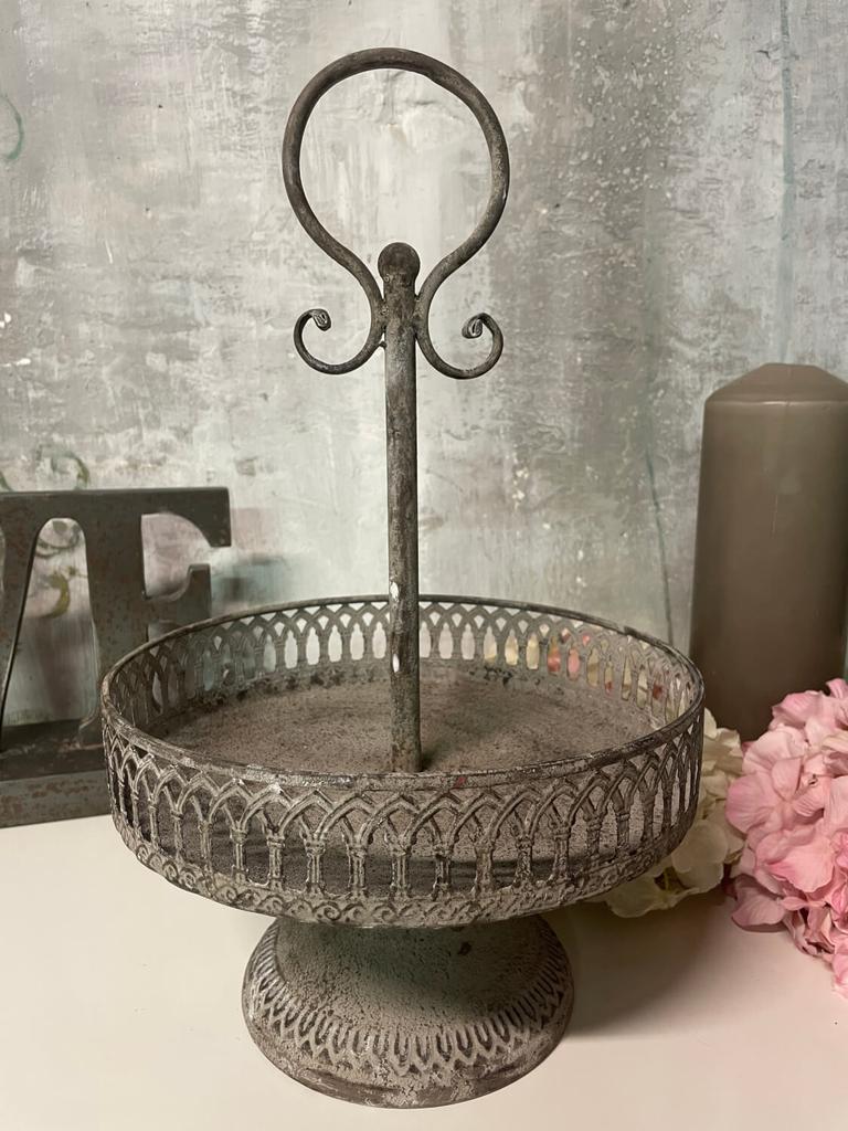 Decorative platter on a leg with a handle metal fruit tray