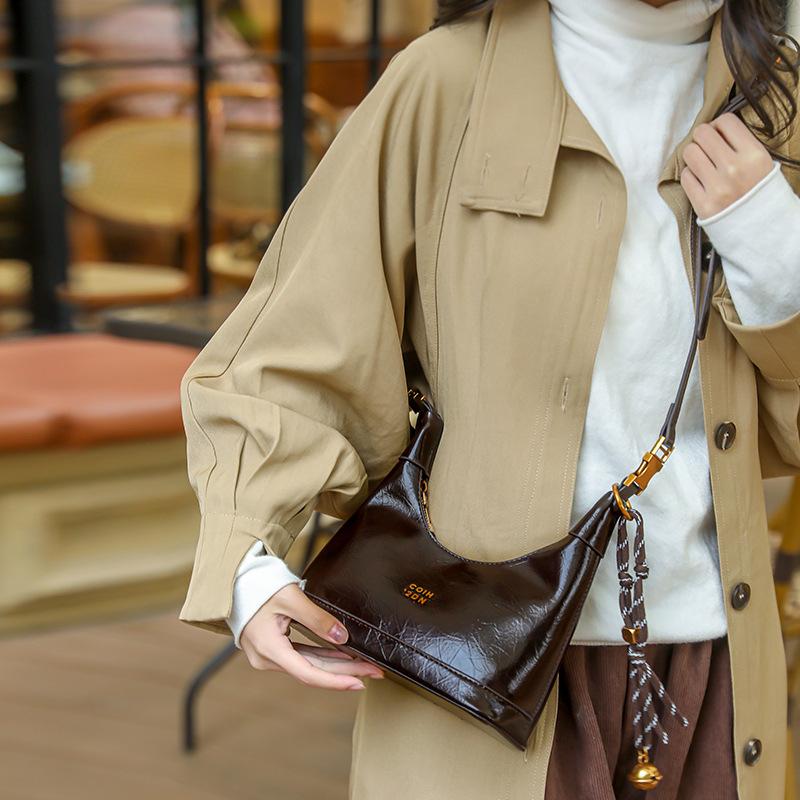 Faux Leather Hobo Bag for Women Fashion Shoulder Bag with Gold Hardware and Tassel Charm Elegant Everyday Handbag