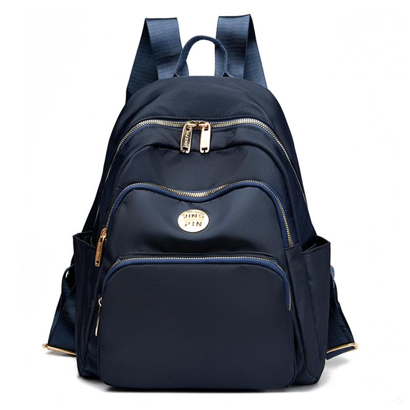 

Рюкзак великої місткості Жіночий однотонний протиугінний рюкзак темно-синього кольору