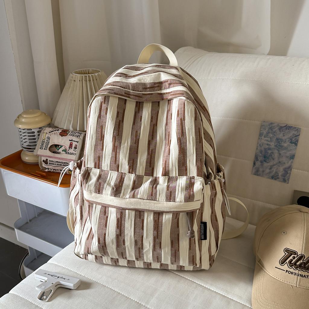 Schoolbag new 1011 high-value schoolbag ins wind lightweight backpack junior high school students versatile commuting large-capacity backpack