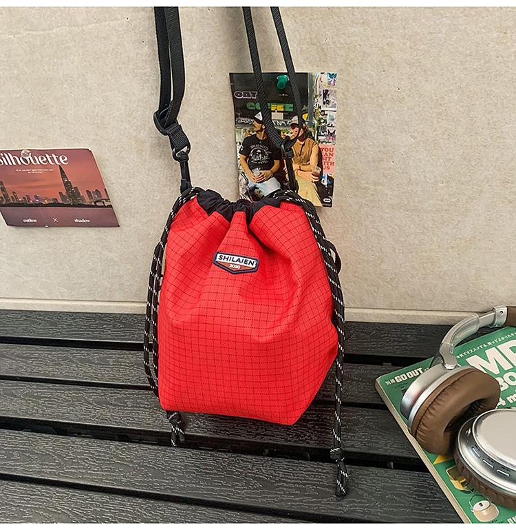 Tide brand messenger bag, men's and women's outdoor sports, girls' drawstring, bundle, color matching, one-shoulder small bucket backpack.