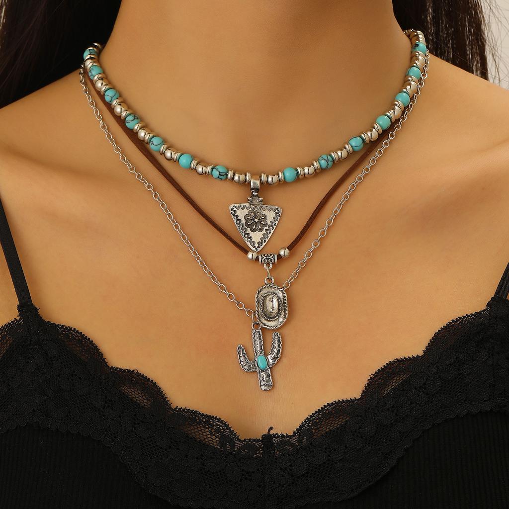 Nuovo set di collane in stile western denim, corda per il collo impilata con cappello turchese e testa di toro retrò, catena per la clavicola.