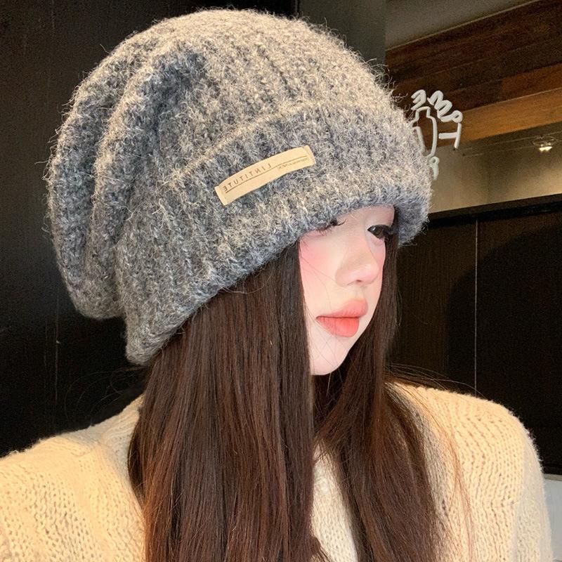 Gray knitted wool hat women's winter versatile warm pile hat showing face small cold hat ear protector bag head hat