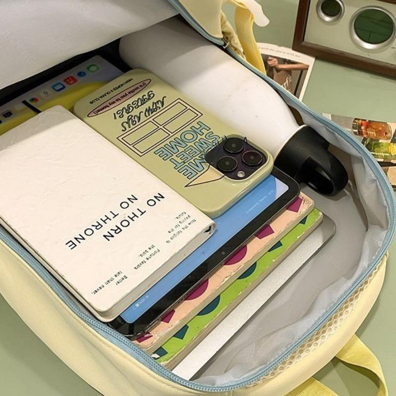 The new schoolbag is high-value, fresh and sweet, macaron-colored make-up bag, junior high school students, light travel, and large-capacity backpack.