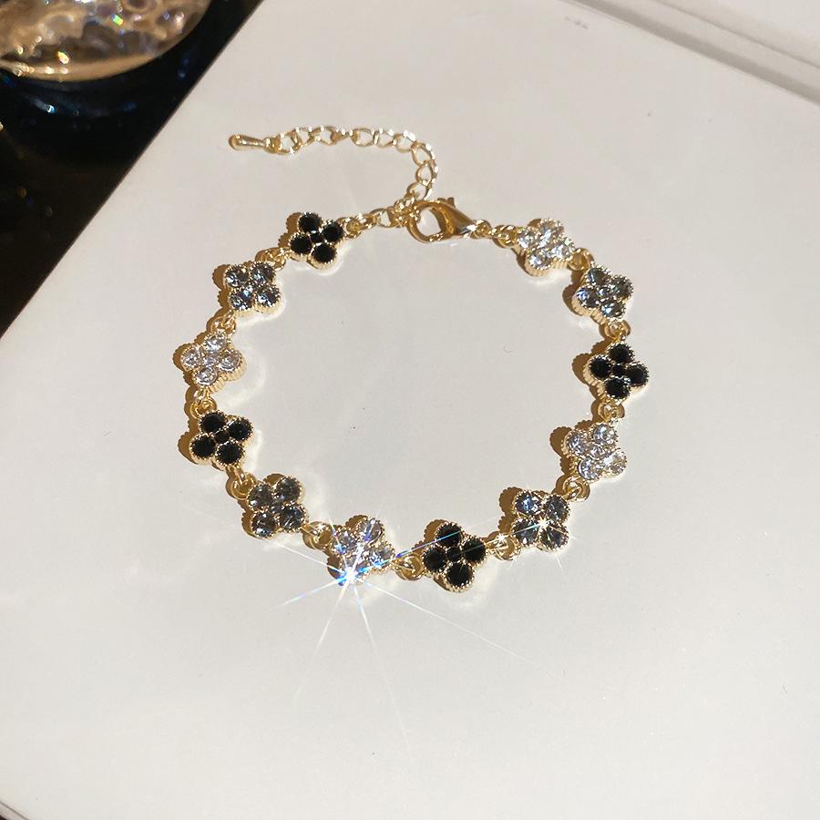 Rhinestone Clover Flower Bracelet: Elegant Retro Design with a Light, Luxurious Touch
