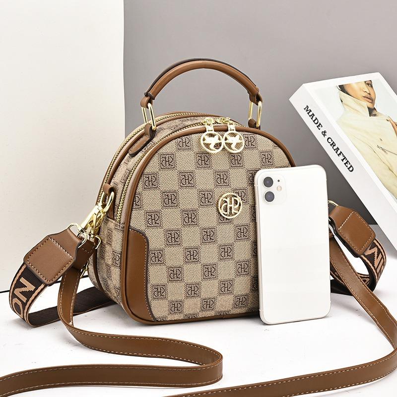 Summer new popular super fire small round bag double shoulder strap single shoulder messenger bag women's one hair