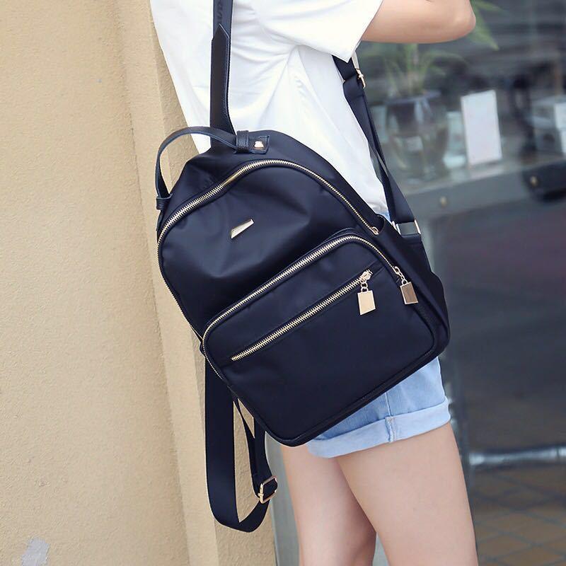 IELGY backpack female Korean version of the trendy Oxford cloth ladies backpack pure color versatile casual waterproof bag