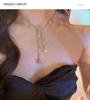 2024 Vintage Double-Layer Pearl Necklace with Heart Pendant