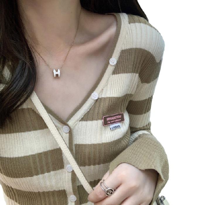 New Spring and Autumnal Polo Collar Striped Knitted Cardigan Jacket Women Bottoming Shirt Design Niche Long-sleeved Top