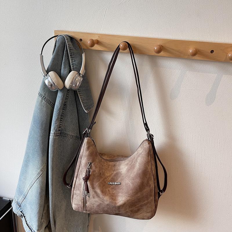 

Niche high-end texture large-capacity tote bag women s autumn new commuter versatile casual personalized messenger bag темно-коричневого