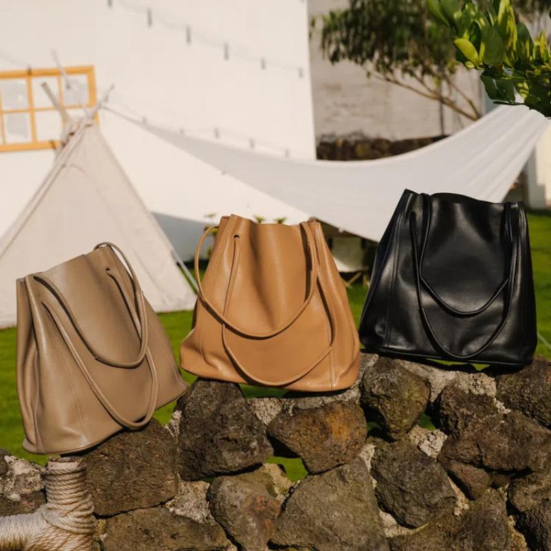 Moale Cowhdie Minimalism Geantă de mână pentru femei Geantă cu găleată Elegantă în stil franțuzesc Geantă mare de tote pentru damă Geantă de lux din piele naturală de marca de designer