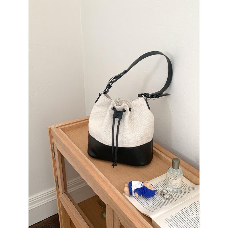 New bucket bag women's drawstring pleated bag niche splicing design women's shoulder bag canvas