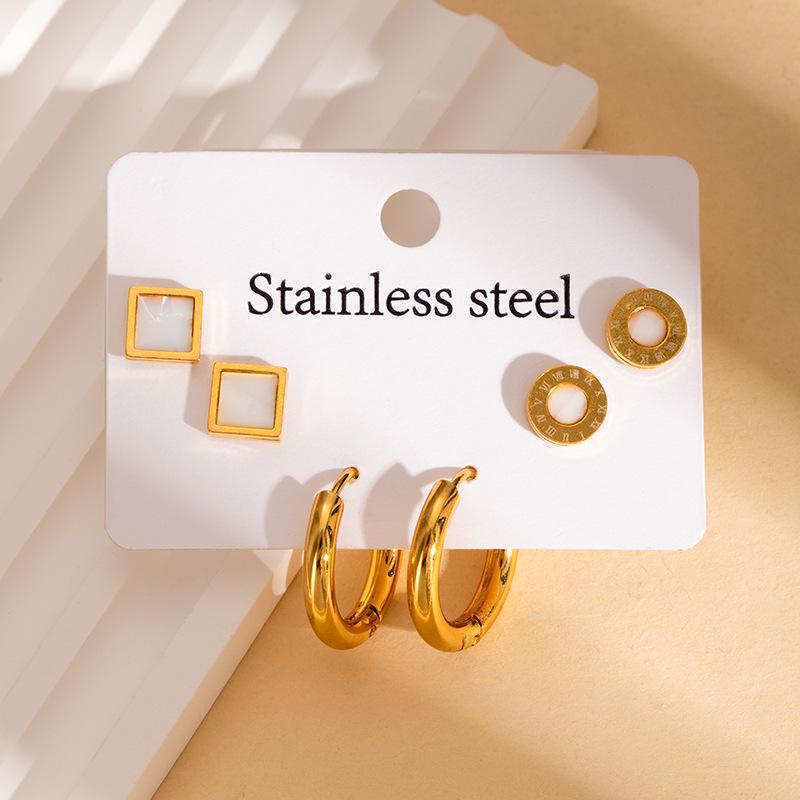 Elegant Stainless Steel Butterfly & Four-Leaf Clover Earrings: Colorfast, Versatile Design for Women.